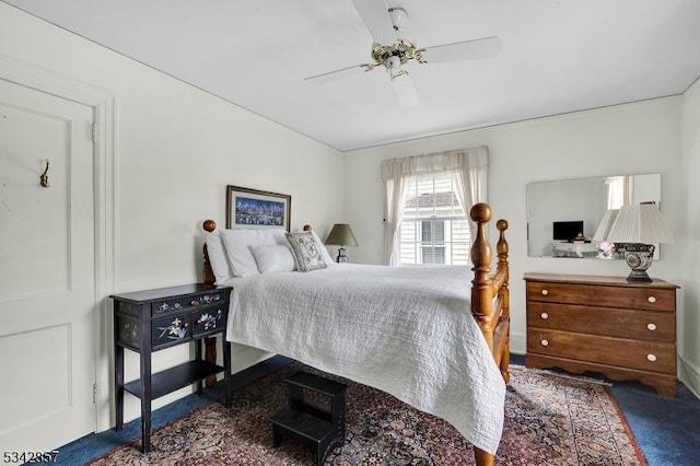 carpeted bedroom with ceiling fan
