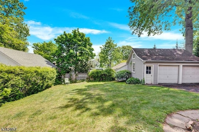 view of yard featuring a garage