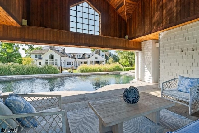 pool with a patio area