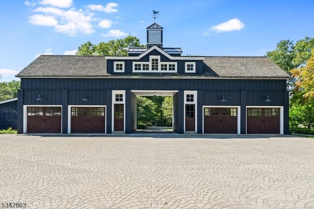 garage featuring driveway