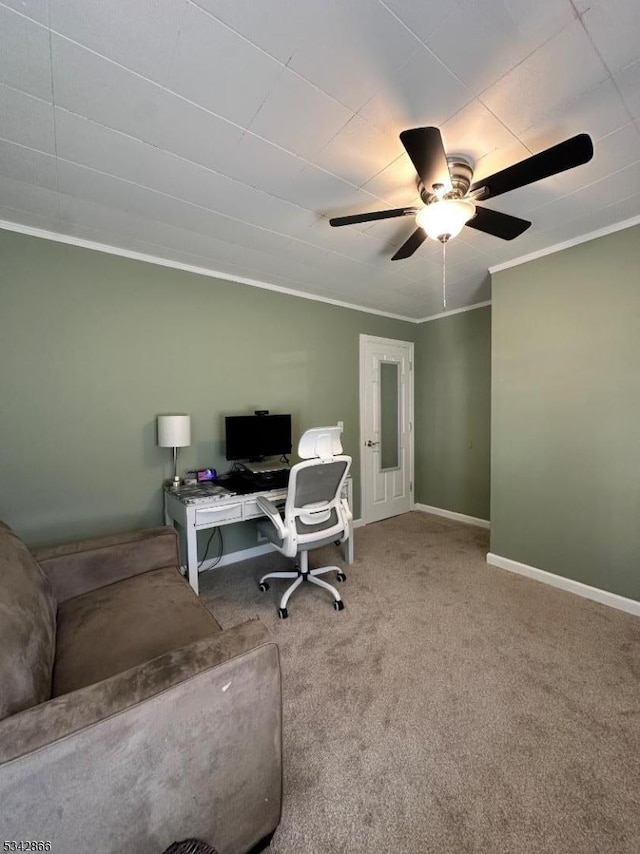 office with carpet flooring, baseboards, a ceiling fan, and crown molding