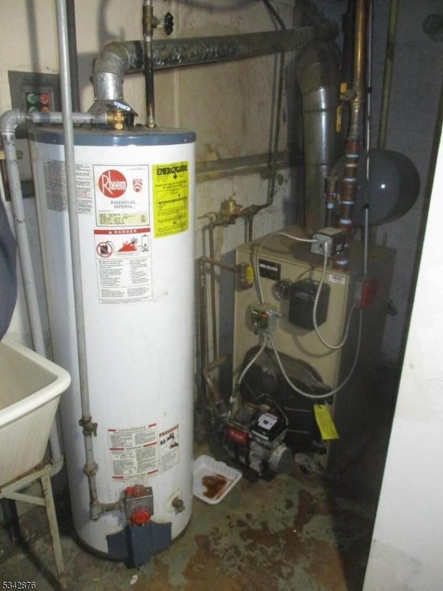 utilities with gas water heater and a sink