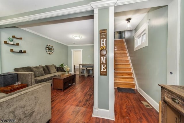 living area featuring stairway, baseboards, visible vents, dark wood-style flooring, and ornamental molding