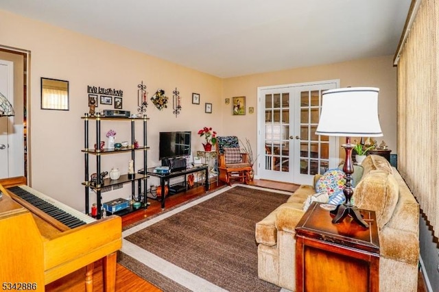 living room featuring french doors and wood finished floors