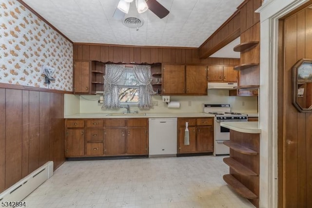 kitchen with open shelves, a baseboard heating unit, white appliances, light countertops, and light floors