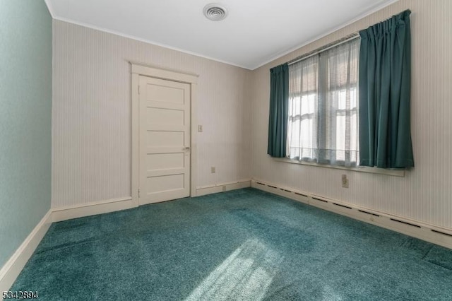 carpeted empty room featuring a baseboard radiator, baseboards, visible vents, and ornamental molding