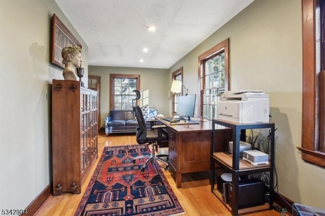 office with recessed lighting, baseboards, and light wood-style floors