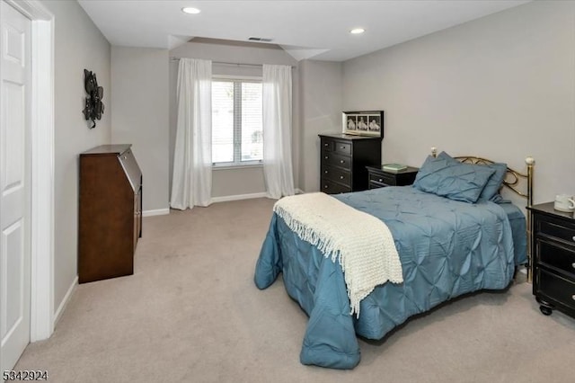 carpeted bedroom featuring recessed lighting, visible vents, and baseboards