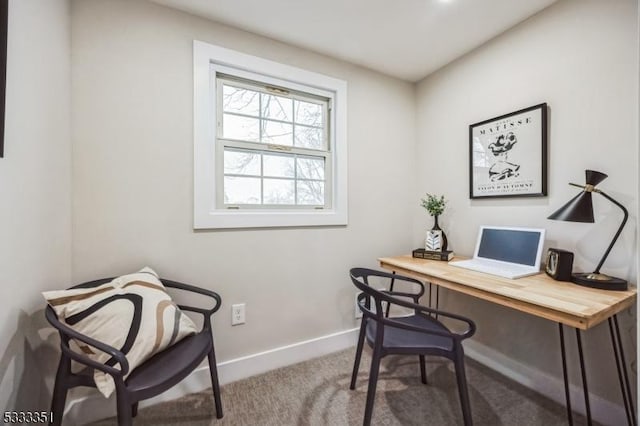 office space with carpet flooring and baseboards