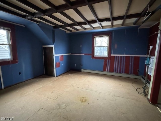 basement with a baseboard heating unit