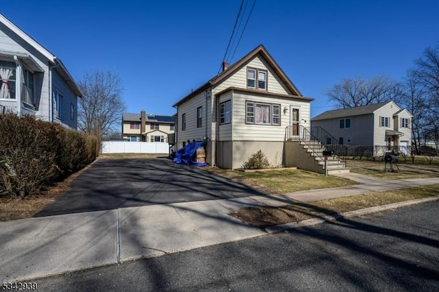 view of side of property with fence