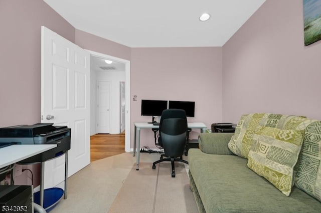 office area with recessed lighting, visible vents, and light carpet