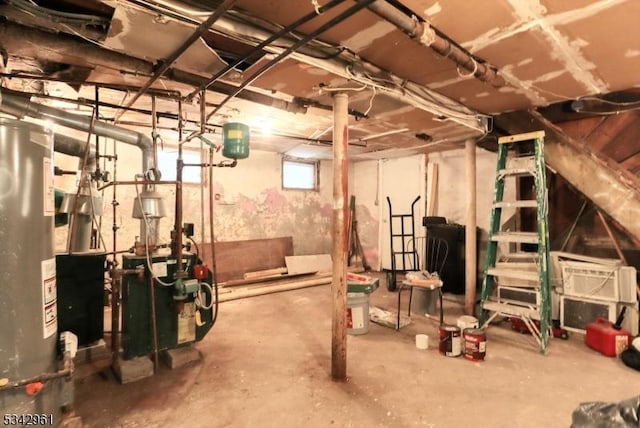 basement with water heater and a heating unit