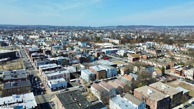 drone / aerial view featuring a city view