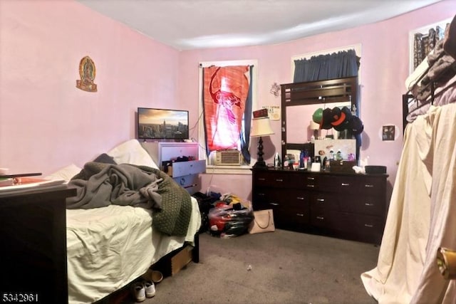 carpeted bedroom featuring cooling unit