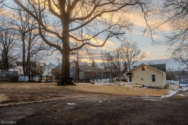 yard at dusk with fence