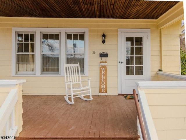 doorway to property with a porch