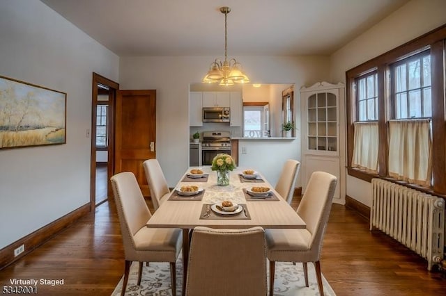 dining space with a chandelier, baseboards, radiator, and dark wood-style floors