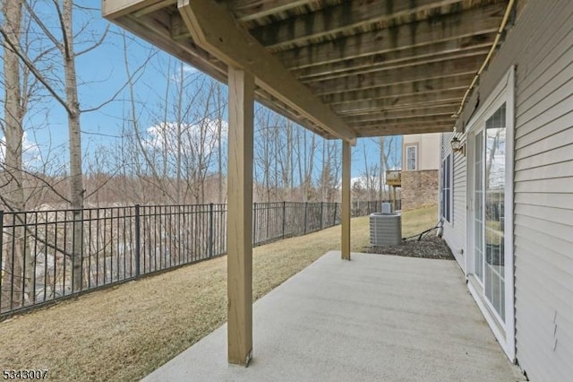 view of patio featuring cooling unit and a fenced backyard