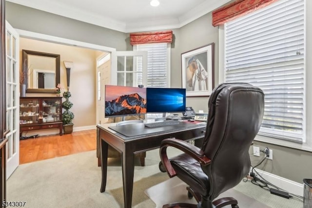 office with baseboards, a wealth of natural light, and ornamental molding