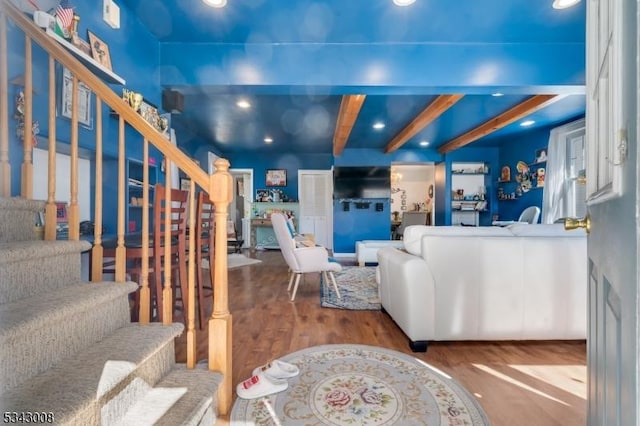 living room featuring recessed lighting, stairway, beamed ceiling, and wood finished floors