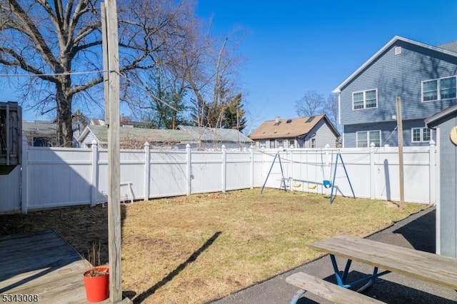 view of yard with a fenced backyard