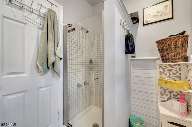 bathroom with a shower stall