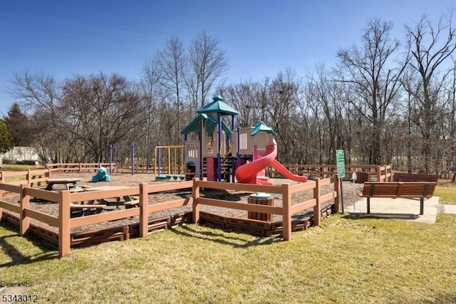 community playground featuring a yard