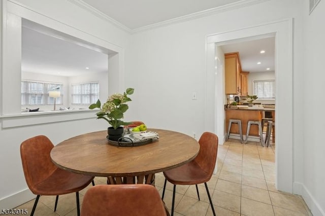 dining room featuring visible vents, baseboards, ornamental molding, recessed lighting, and light tile patterned flooring