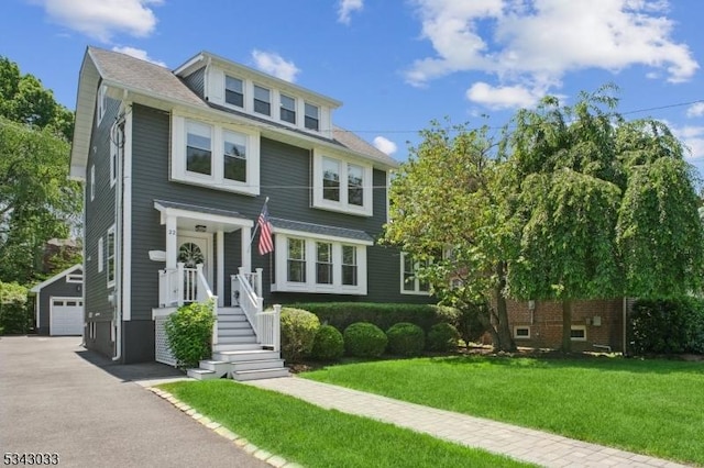 22 Salter Pl, Maplewood Twp, NJ 07040 - american foursquare style home featuring an outdoor structure, a detached garage, and a front lawn