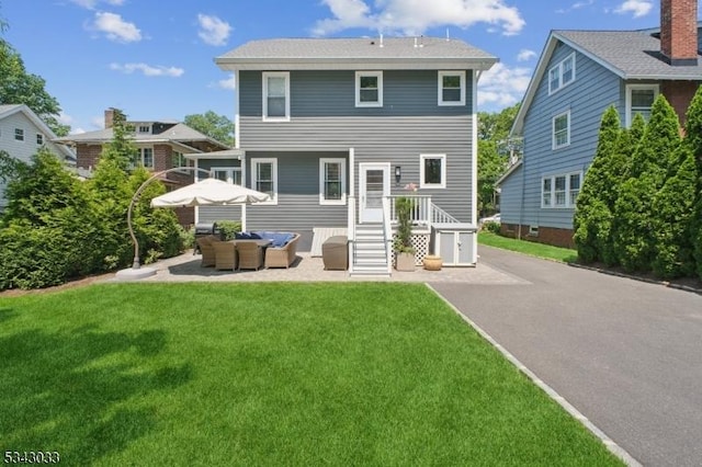 22 Salter Pl, Maplewood Twp, NJ 07040 - back of property featuring an outdoor hangout area, a lawn, and a patio