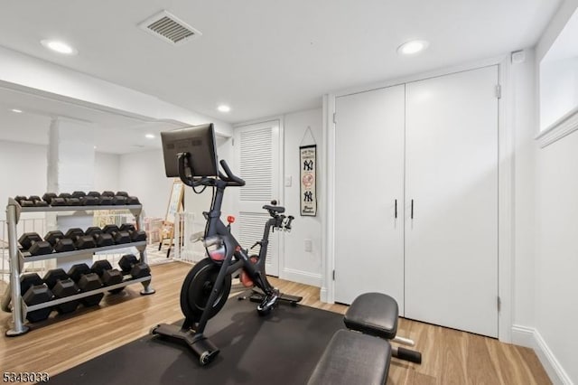 22 Salter Pl, Maplewood Twp, NJ 07040 - exercise room with light wood finished floors, recessed lighting, and baseboards