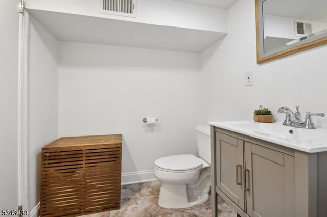 22 Salter Pl, Maplewood Twp, NJ 07040 - bathroom featuring vanity, toilet, and baseboards
