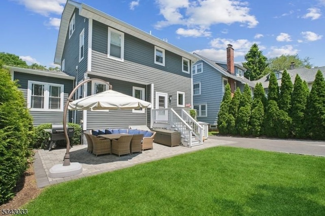 22 Salter Pl, Maplewood Twp, NJ 07040 - back of house with outdoor lounge area, a lawn, and a patio area