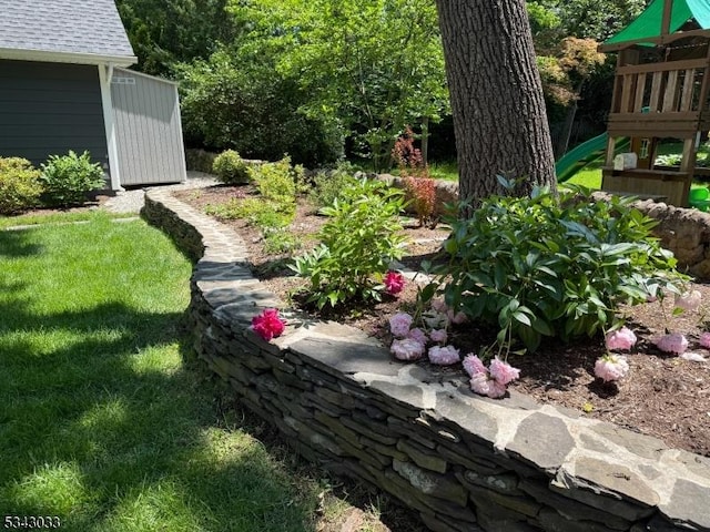 22 Salter Pl, Maplewood Twp, NJ 07040 - view of grassy yard with a playground