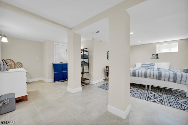 bedroom featuring light tile patterned flooring, recessed lighting, and baseboards