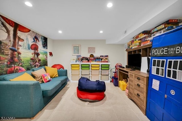 recreation room featuring light tile patterned floors and recessed lighting