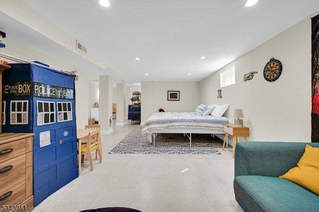 bedroom featuring light tile patterned flooring, visible vents, and recessed lighting