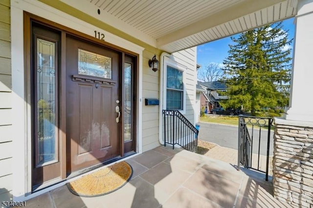 property entrance with a porch