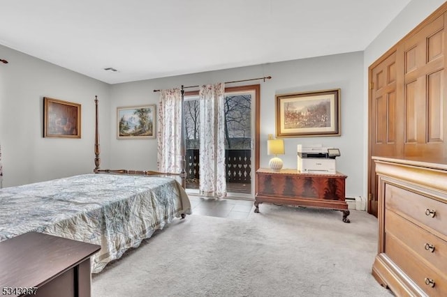 bedroom featuring carpet floors, baseboard heating, visible vents, and access to outside