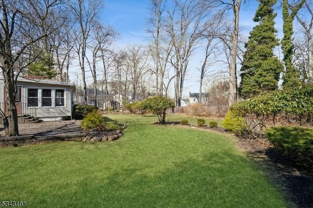 view of yard with entry steps