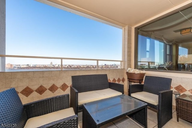 balcony featuring a sunroom