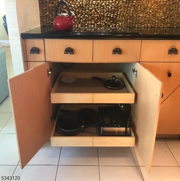 interior details featuring dark countertops