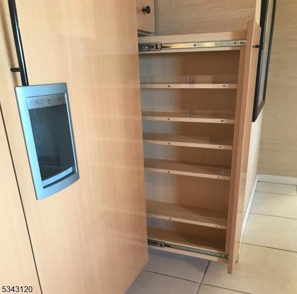 pantry featuring beverage cooler