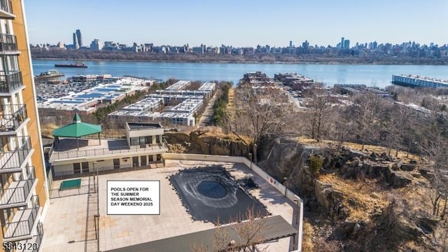 bird's eye view with a city view and a water view