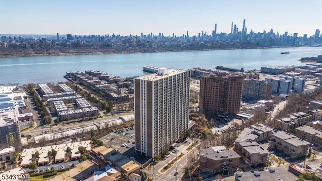 bird's eye view with a view of city and a water view