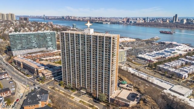 aerial view featuring a city view and a water view