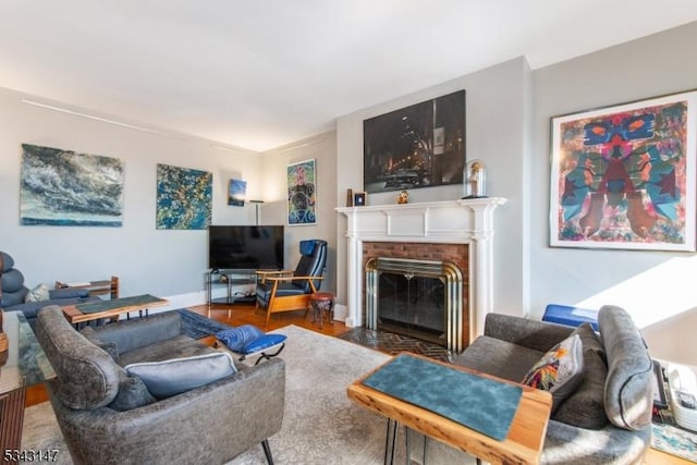 living room featuring a fireplace