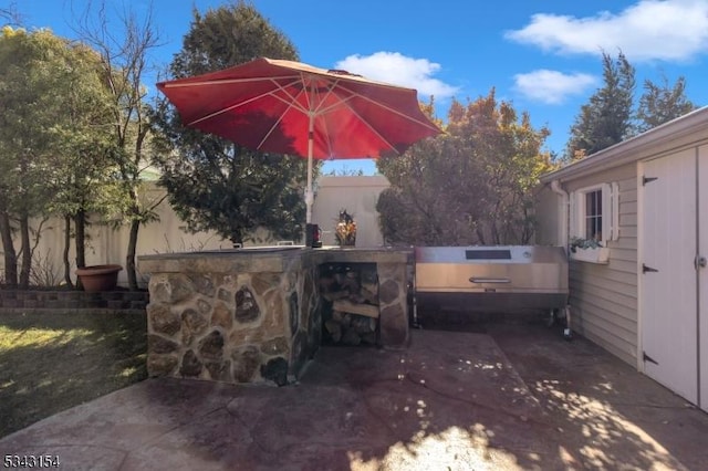 view of patio / terrace with fence