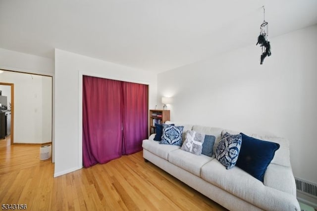 living room with wood finished floors